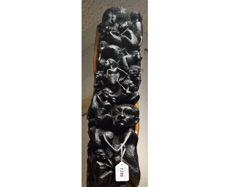 Tribal Art - an African hardwood tree trunk carving of figures climbing, 61cm high