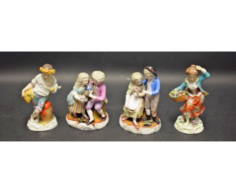 A pair of German figures, Allegorical of the Seasons, Summer and Autumn, they stand bare footed, she with a basket of flowers