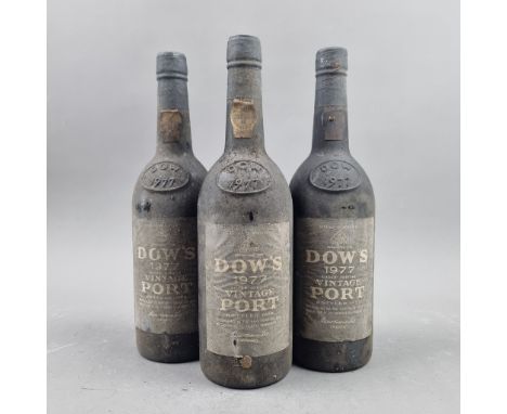3 Bottles Dow's 1977 Vintage Port - Queens Silver Jubilee   (Please note signs of seep as per photo. Heavily Bin Soiled, more