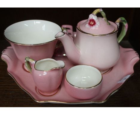 A Royal Winton breakfast set, teapot, cup, sugar, milk, toast rack &amp; tray