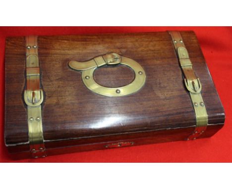 A late Victorian brass banded playing card box, the banding in the form of buckled straps, 27cm  Condition: Split all along f