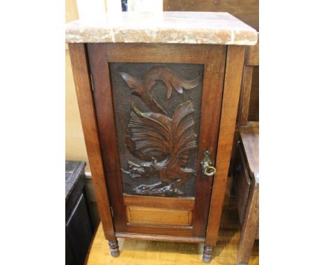 A c.19th century mahogany pot cupboard, having marble top &amp; dragon carving to door