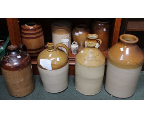 A selection of stoneware vessels, includes jugs, barrels, etc Additional info: Large jugs names - Peter Walker & Co. Burton-o