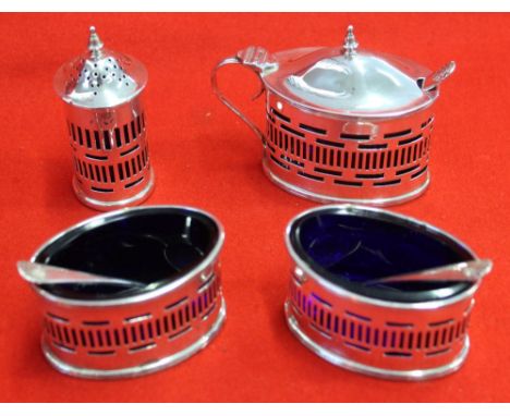 A Regency design silver four piece silver condiment set, comprising pair of salts, pepper pot and lidded mustard with blue gl