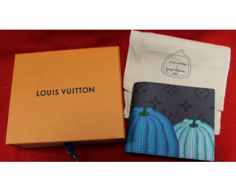 A Louis Vuitton brand new boxed very rare Pumpkin design gentleman's wallet