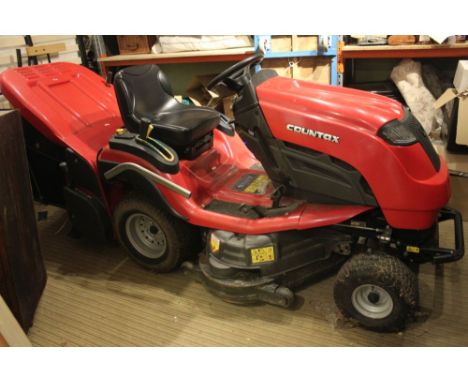 A Countax C60 Lawn Tractor in red with key, currently the battery is flat &amp; has a flat tyre