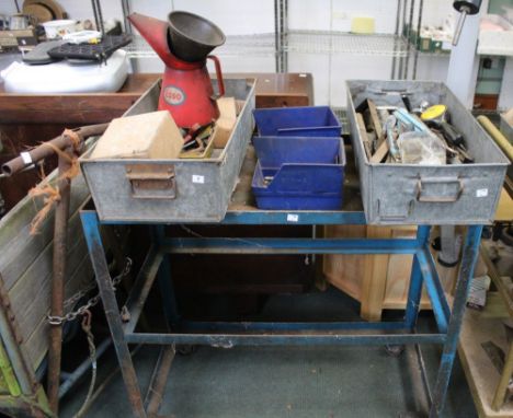 A metal trolley with wheels, containing a large &amp; varied selection of engineering equipment, to include a vintage ESSO oi