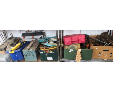 A shelf full of tool, stool boxes, etc