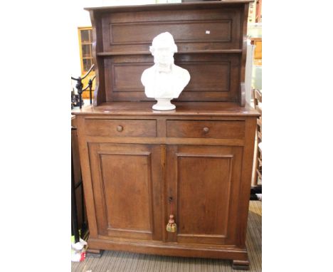 A 19th century oak sideboard with shelf upstand, two drawers over two cupboard doors&nbsp;&nbsp;