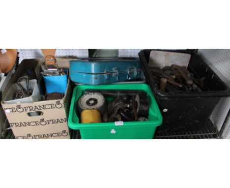 A shelf containing a large &amp; varied selection of tools