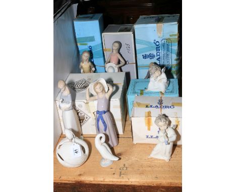 Eight Lladro and one Nao figurines including cherubs, geese, etc.