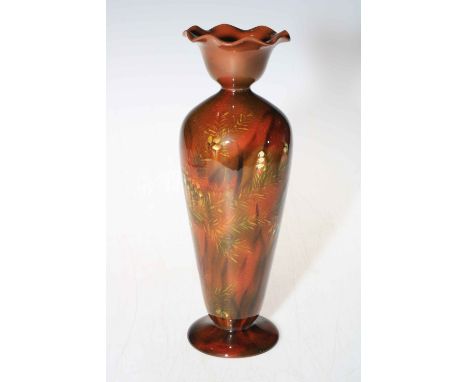 Linthorpe Pottery slim bodied vase with floral design on brown ground, number 1755.