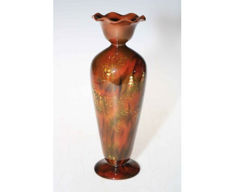 Linthorpe Pottery slim bodied vase with floral design on brown ground, number 1755.