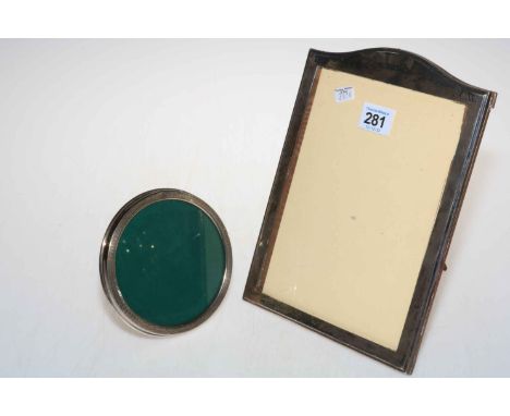 Silver rectangular easel photograph frame, 25cm by 18cm, Birmingham 1918, together with circular silver frame (2).
