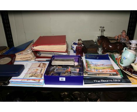 Collection of coins, albums of stamps and first day covers, cutlery, china, reference guides, etc.
