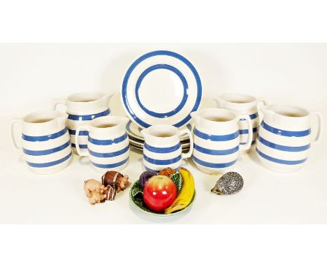 Various Staffordshire ironstone chef ware jugs, blue and white bands, plates, bowls,&nbsp;a ceramic bowl with ceramic fruit, 