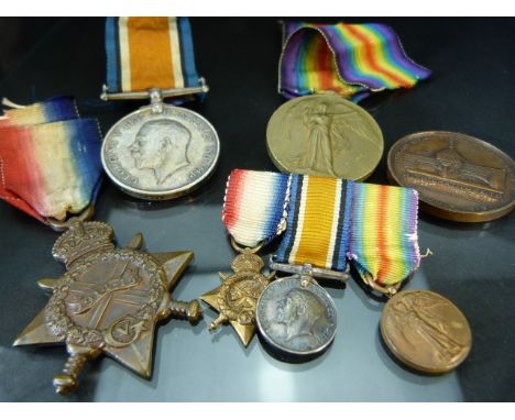 Trio of WWI medals awarded to PT E. H.W. WALTER MIDDX. R. (G-4893) with ribbons and all inscribed with miniatures. Accompanie