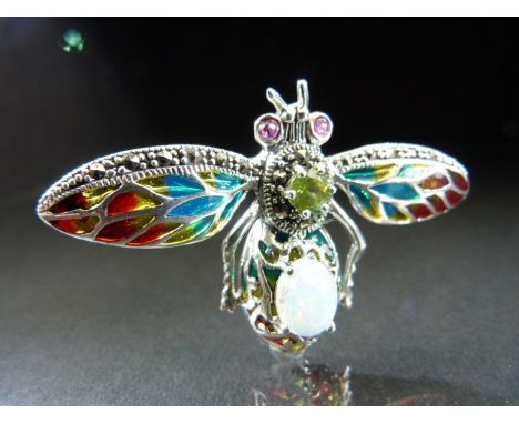 Silver and Plique - a - Jour brooch in the for of a bug with opal body