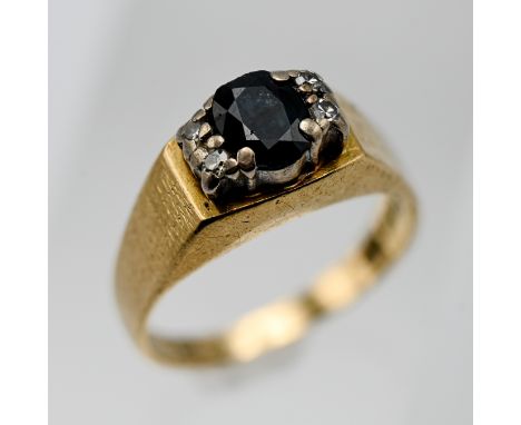 An 18ct yellow gold sapphire and diamond five stone ring, approx weight sapphire 0.70ct and approx weight of diamond 0.04ct, 