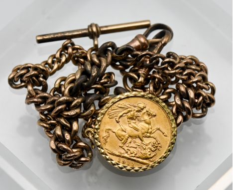A 9ct gold curb link watch chain with 'T' bar, attached George V 1911 gold sovereign mounted as a pendant, total weight appro