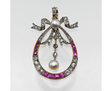 A fine Edwardian ruby and diamond pendant set in yellow gold.