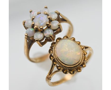Two 9ct opal set rings, approx 5.36g (2).
