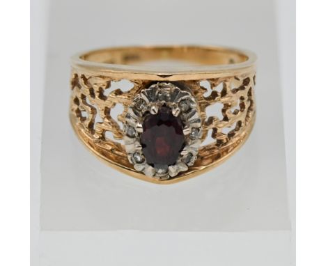 A 9ct yellow gold garnet and diamond oval cluster ring, approx weight of garnet 0.65ct and approx weight of diamonds 0.04ct, 