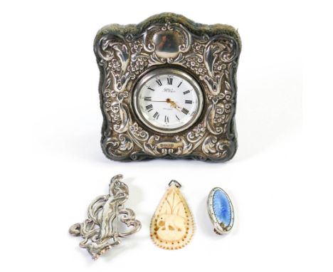 Pressed Silver cased clock, Silver Art Noveau style brooch and two other pendants. (4)