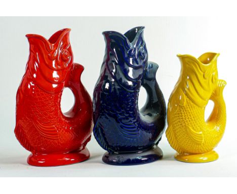 Wade Gluggle jugs, tallest 27cm. These were removed from the archives of the Wade factory and are possible prototypes or colo