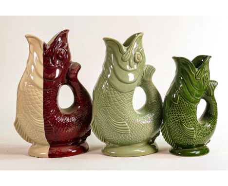 Wade Gluggle jugs, tallest 27cm. These were removed from the archives of the Wade factory and are possible prototypes or colo