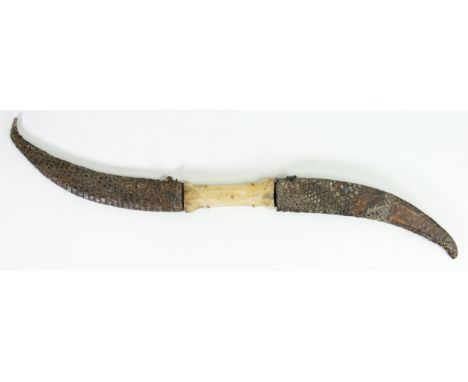 Sudanese Haladie double blade dagger. Handle made from camel bone with snakeskin sheaths. Blade decorated with Quaranic scrip