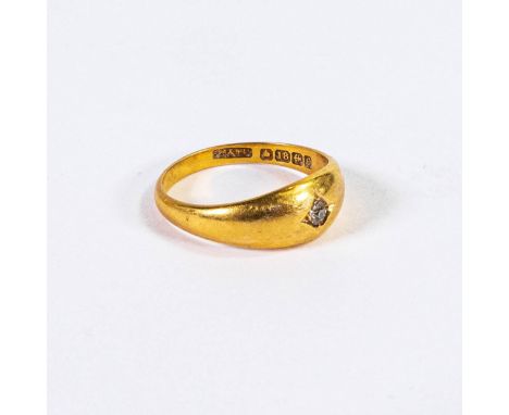 18ct gold and single diamond gypsy set ring, hallmarks for Birmingham 1904, UK size P, 4.67g. 