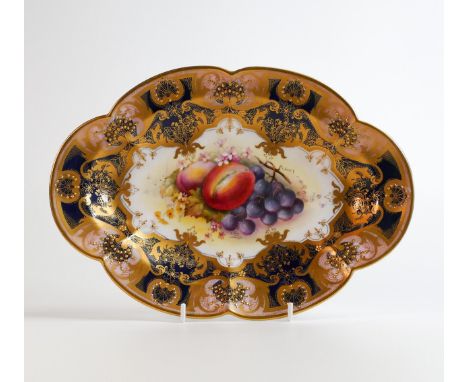 Royal Worcester shaped oblong gilded dish decorated with fruit by E.Phillips, puce factory mark, L.27.5cm, a/f - two 6cm hair
