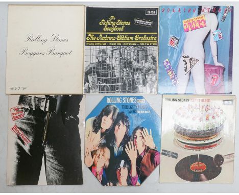 A collection of Rolling Stones LP Records to  include Through The Past Darkly, Sticky Fingers, Let it Bleed, Beggars Banquet,