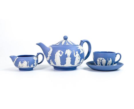 Wedgwood blue Jasper ware tea pot, cream jug &amp; cup/saucers set. (4) 