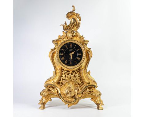 Early 20th century Louis XV style brass mantle clock, dial marked J Dusart, Brussels, missing pendulum. h.53cm. 