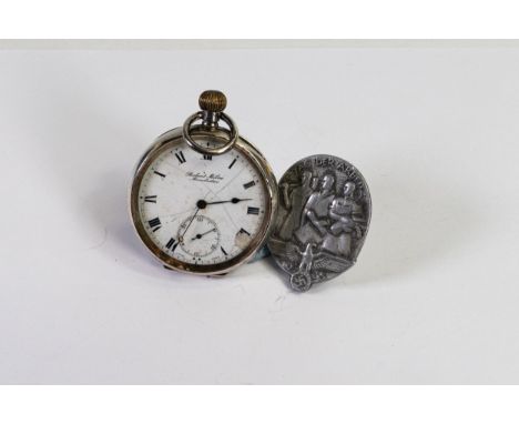 Silver keyless pocket watch from Robert Milne, Manchester, together with Nazi 1935 pre WWII badge 