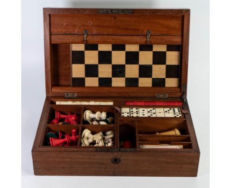 Edwardian Mahogany cased games compendium set, comprising original Chess/Draughts sets, dominoes etc., 36 x 23 x 11cm. 