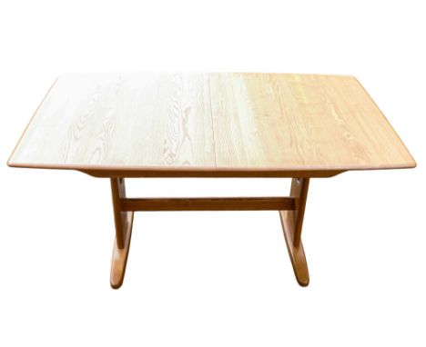 Late 20th century Light coloured Ercol Windsor medium dining table (extendable) 1193 plus specially made table protector matt