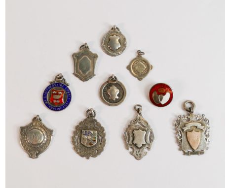 A good collection of silver shield medals including enamelled Staffordshire County Bowling badge, gold on silver badge etc., 