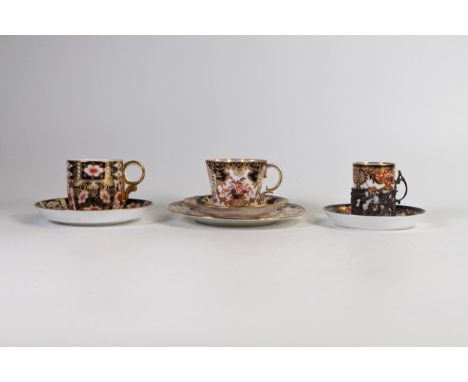 Royal Crown Derby Imari trio, Imari cup and saucer and Imari coffee can with silver holder. (7) 