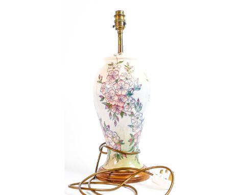 Large Moorcroft Apple Blossom lamp base. Height to fitting 33cm, with wooden base - crazing. 