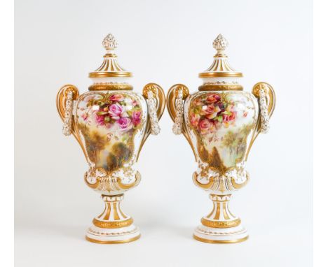 Royal Worcester pair of gilded two handled vase &amp; covers decorated with garden &amp; roses by F Roberts, shape 2394, puce