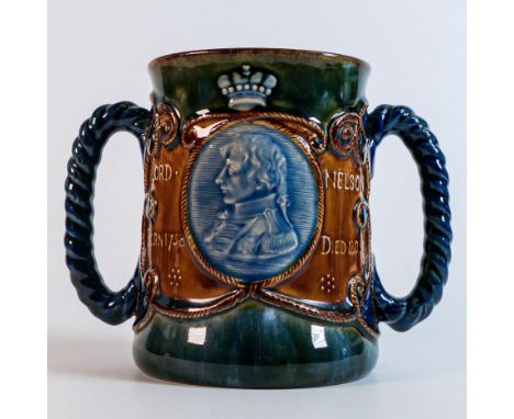 Royal Doulton Stoneware commemorative Admiral Lord Nelson two handled loving cup, decorated by Bessie Newberry, with two appl