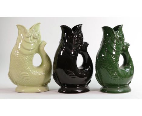 Wade Gluggle jugs, tallest 27cm. These were removed from the archives of the Wade factory and are possible prototypes or colo