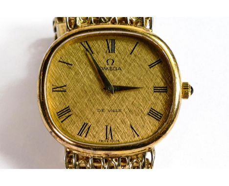 9ct gold Omega DeVille manual wristwatch, with 9ct Omega bracelet, boxed with certificate and original purchase receipt dated