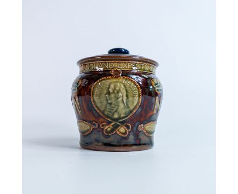 Royal Doulton Stoneware commemorative Admiral Lord Nelson tobacco jar and cover, modelled in low relief with portrait plaque.