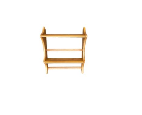 Late 20th century Light coloured Ercol small shelving unit, length 43cm, depth 20cm &amp; height 51.5cm 