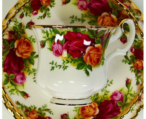 A large collection of Royal Albert tea &amp; dinner ware to include - tea &amp; coffee pots, dinner plates, trios, salad plat