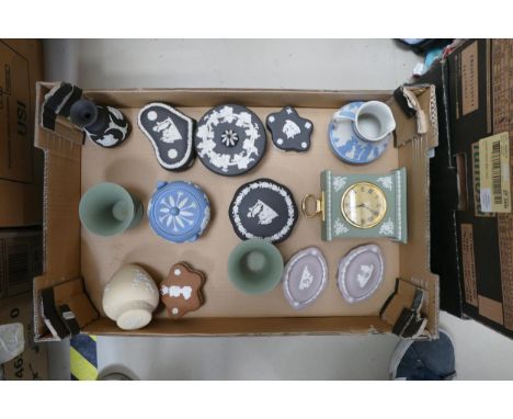 A collection of multi coloured Wedgwood items to include lemon ginger jar, sage green vases &amp; Mantle clock, lilac lidded 